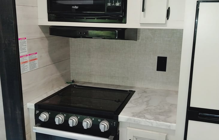 Microwave, stove & oven.