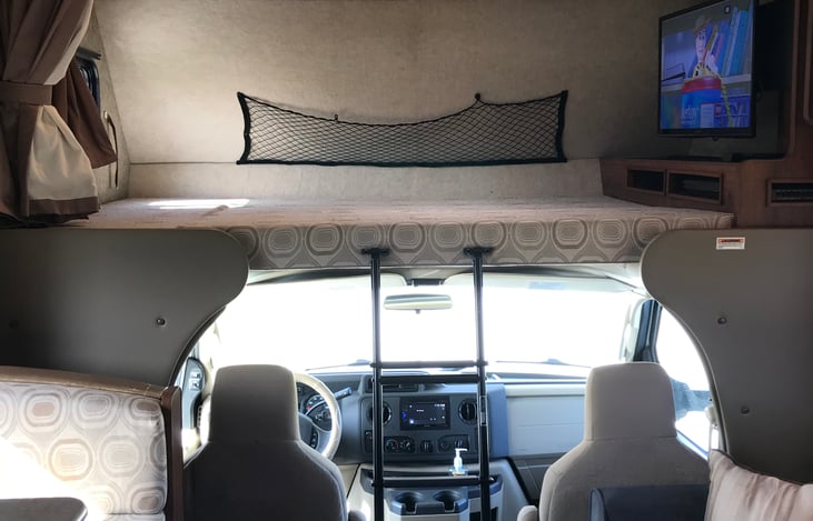 Cab over bed view with ladder in position.