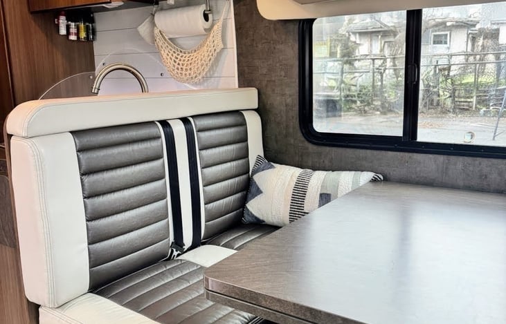 Cross body seat belts provided on the dinette, for comfortable and safe travel.