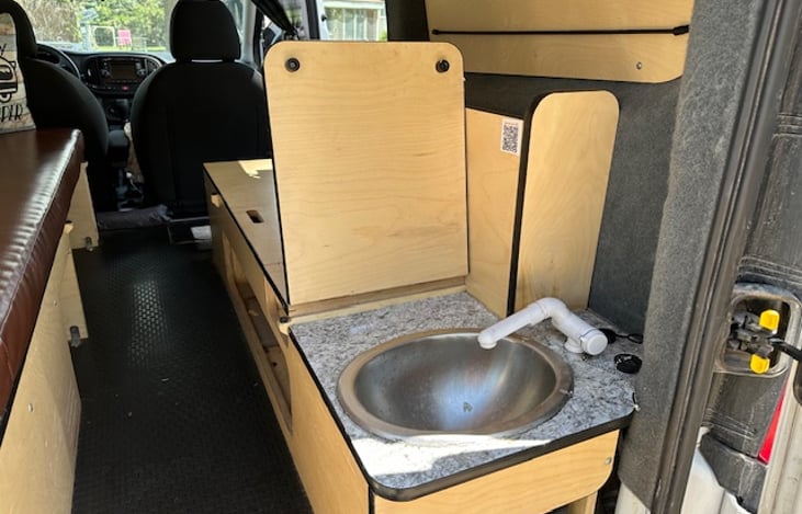 Sink with running water.