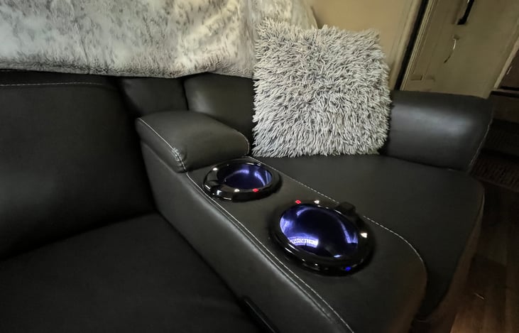 Double recliners equipped with USB charging, heating and vibrating seats.