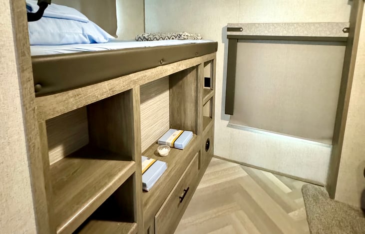 3 Bunks in second rear bedroom.