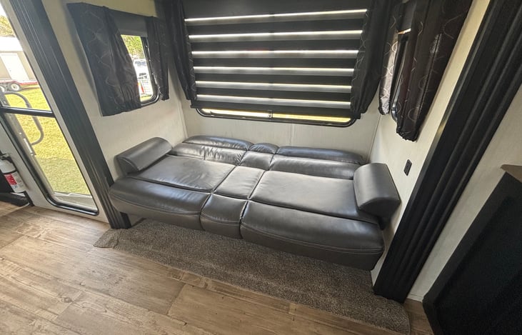 Sofa 1  in the living area that folds out to full size bed