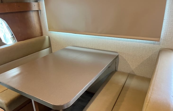 Dinette folds down into small bed