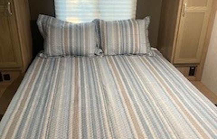 Bedroom with queen size bed.