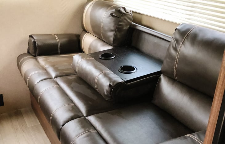 Jack knife sofa with cup holders