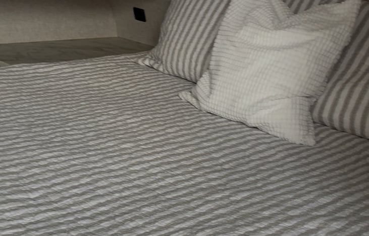 Convenient USB ports are located above the nightstands on each side of the queen bed for charging your devices.