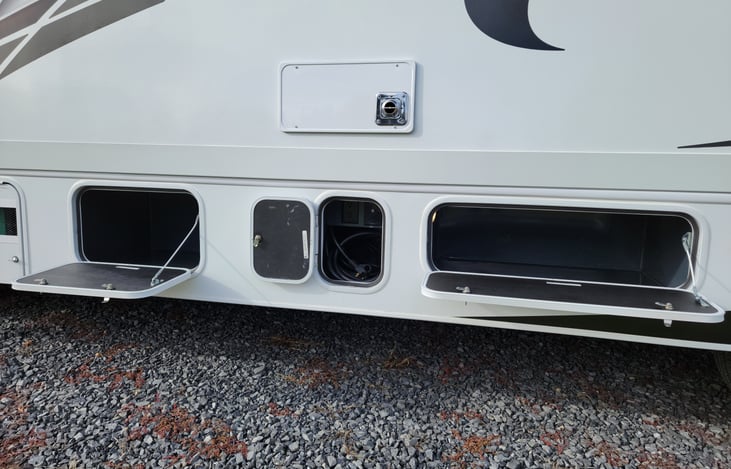 30 AMP Shore Power + 2 additional driver side storage compartments