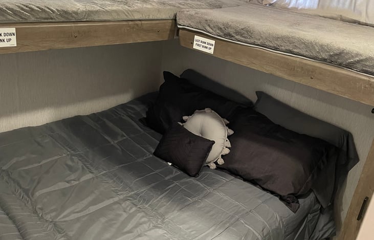 Bed can be turned into a couch when not in use as bed