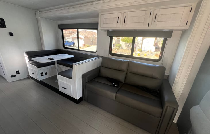 Couch and dinette both turn into beds