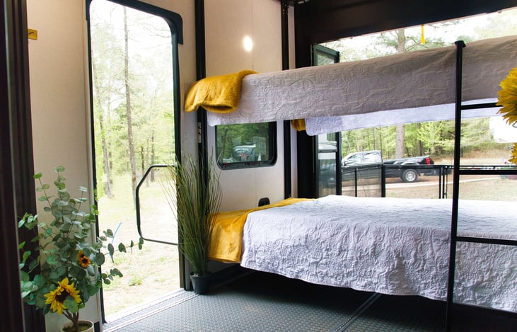 If you'd like, open that back wall up and listen to whatever is out there, then you are just one step away from your private deck. One BIG step if you slept in the top bunk!