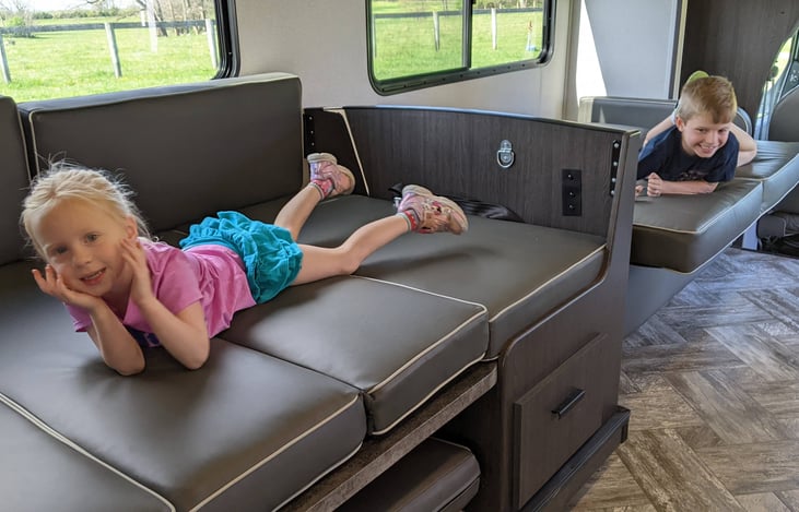 Dining and couch converted to beds