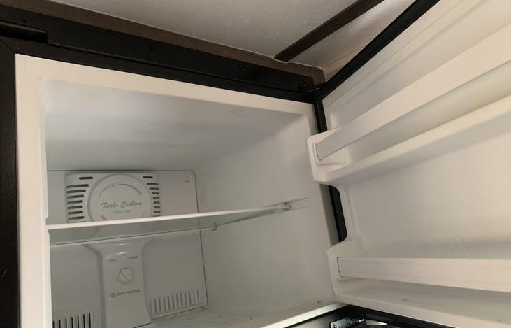 Good-sized freezer for Popsicles on those hot summer days.