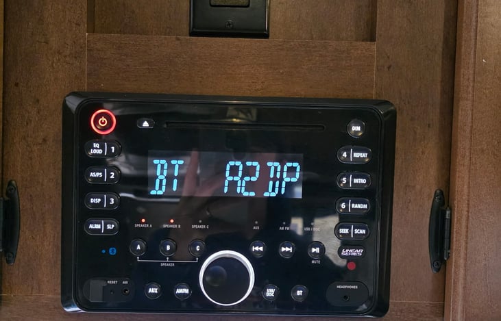 Bluetooth Audio System, includes radio, CD player, connection to indoor and outdoor speakers