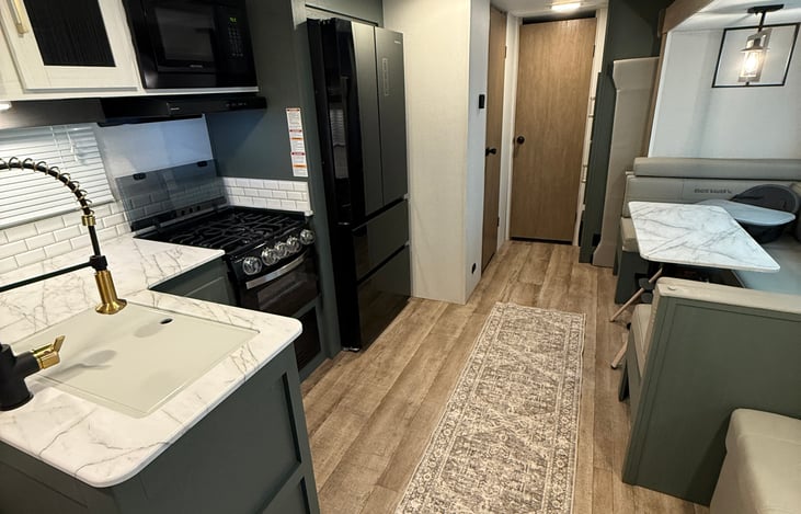 Common area! This area includes a pull out couch and dinette conversion!