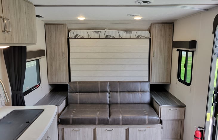 Leather couch with storage all around