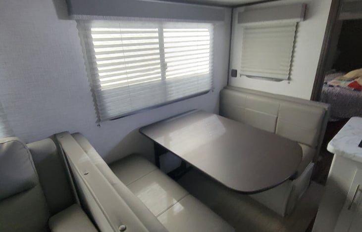 Dinner Table, folds down into another bed.