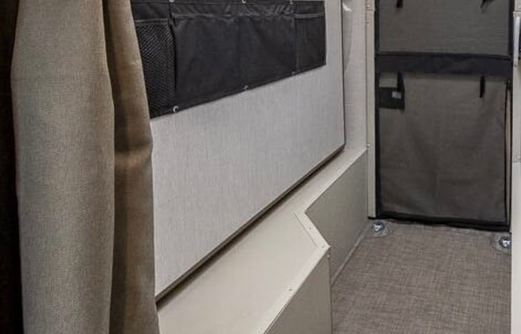 Rear bed folds up to make room for bikes/storage