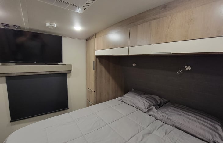 Master Bedroom w/ 12" Memory foam mattress and 32" TCL Roku TV