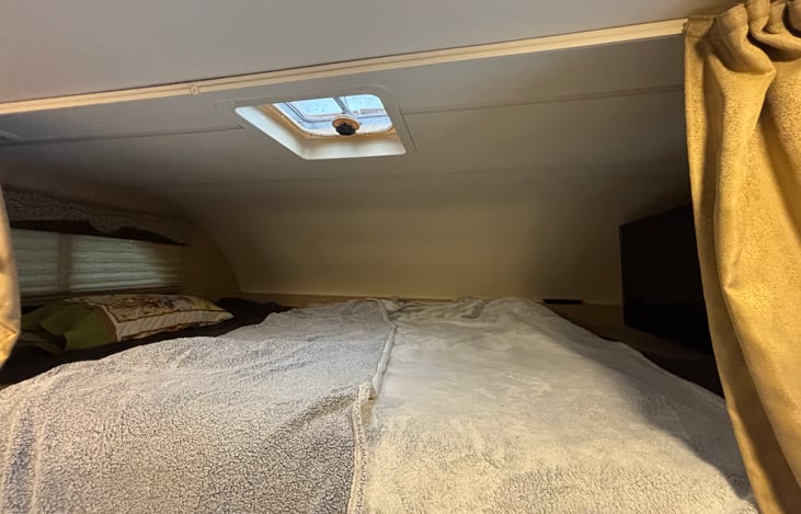 King size bed upper bunk.