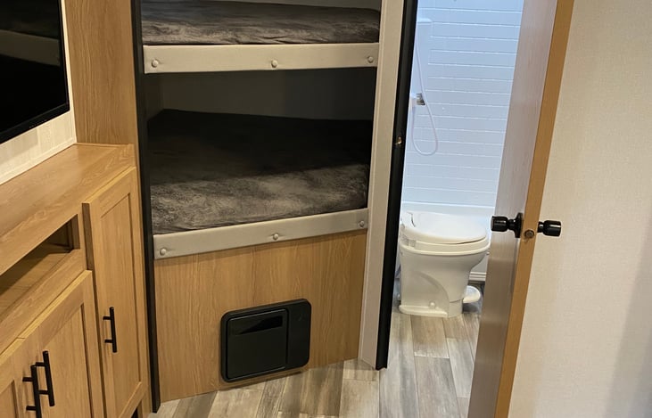 LARGE DOUBLE BUNKS EQUIPPED WITH USB CHARGING PORTS AND BUNKLIGHTS