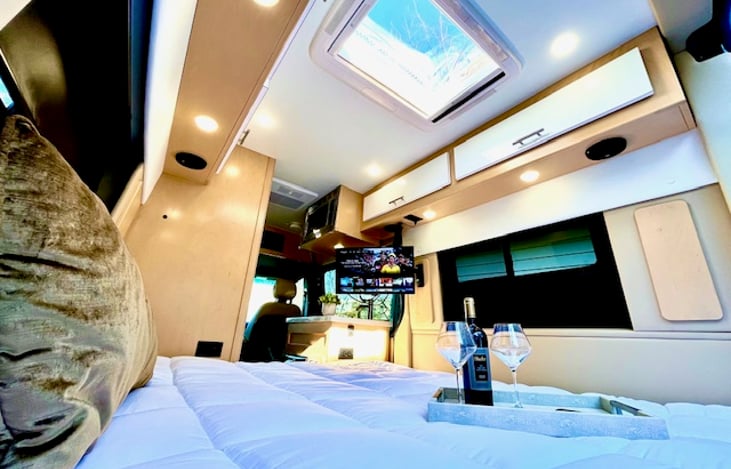 After a long day of adventure, wind down in your comfy bed.  It's easy to stargaze... just look up right through the skylight above you!