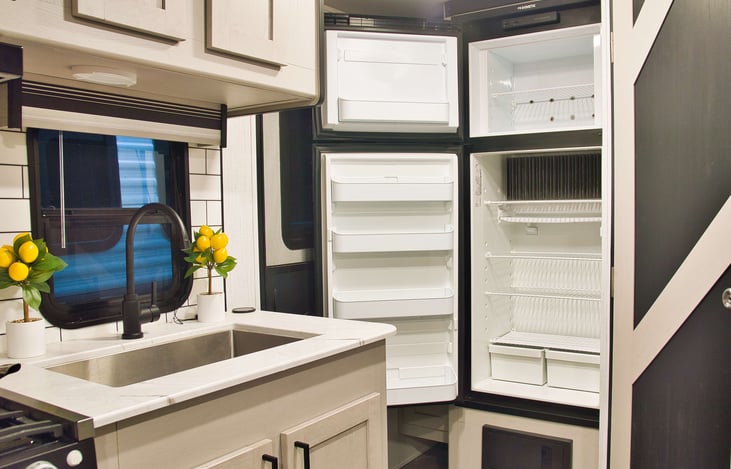 Check out that fridge! For a little camper it has a decent size refridgerator & freezer.