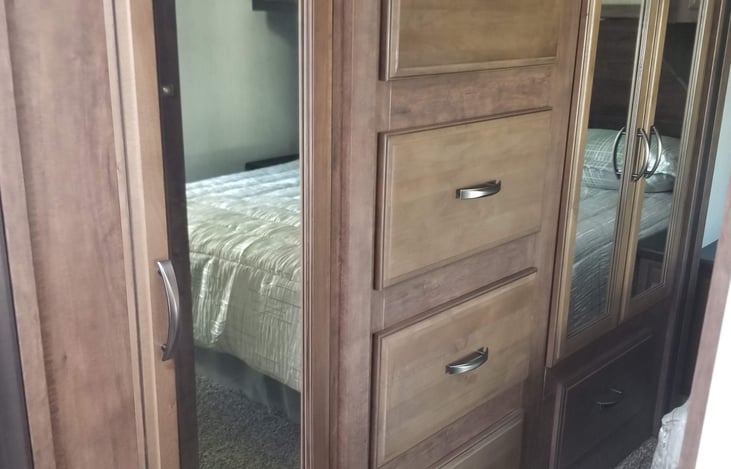 Master closet, drawers and linen closet for additional storage.