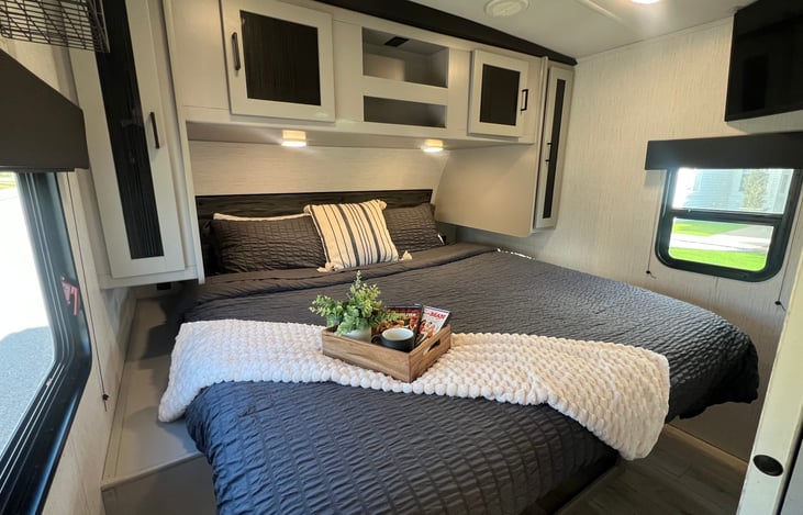 Private king bedroom with comfortable bedding and a relaxing feel.