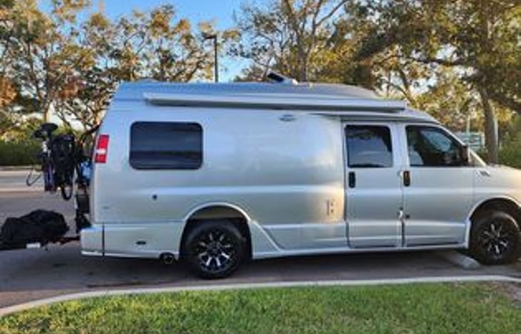Generally fits in most parking spaces. I had to overhang the front due to the bike rack and cargo racks that are optional to rent.