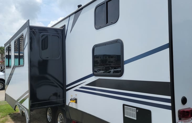 Right rear with water, sewer, and electrical hookups.