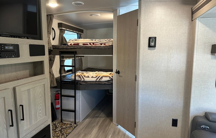 Power outlets and USB ports in each bunk