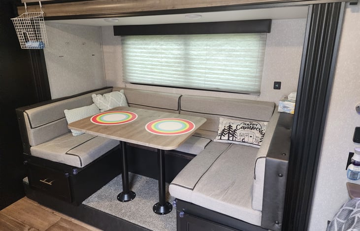 Slide out dinette and converts into a full size bed