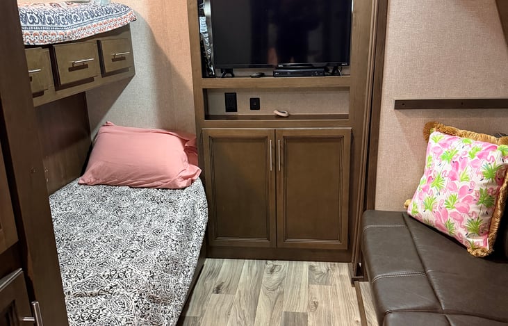 Bunk room with own entertainment area