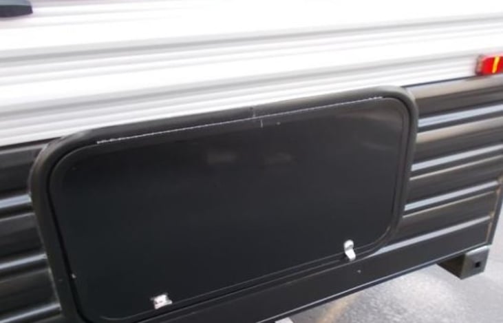 Exterior storage space door