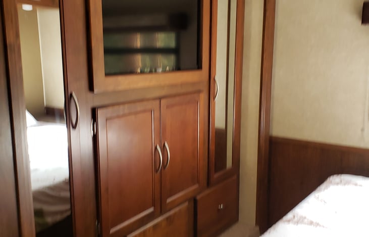 Primary Bedroom-TV, closet and storage.