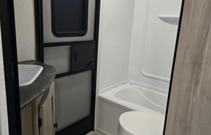 Full bathroom with entry from outside