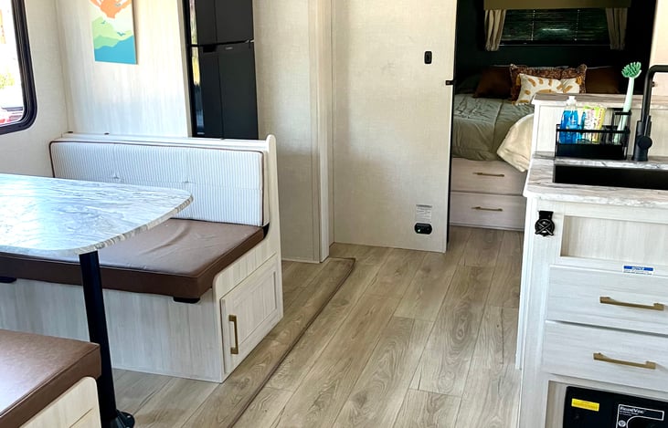 There is 2 outdoor collapsible chairs in the right dinette bench available for you to use.