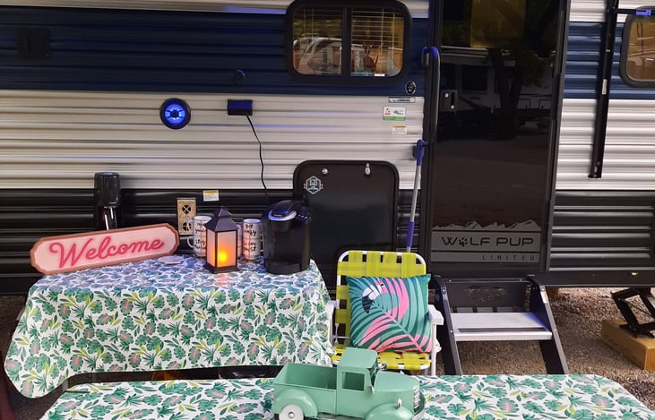 Cooking table. Keurig Coffee maker, bubbly machine upon request, lantern on timer.