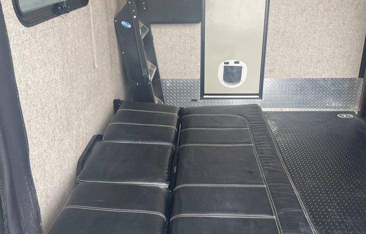 Sleeping Area 4 - Garage sofa folds down into a twin sleeper, or you can store it upright and fit up to a king sized air mattress on the floor (optional).