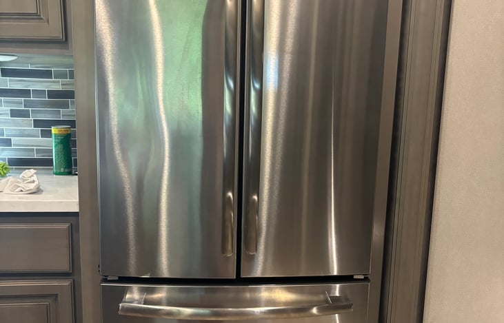Residential refrigerator and freezer with icemaker