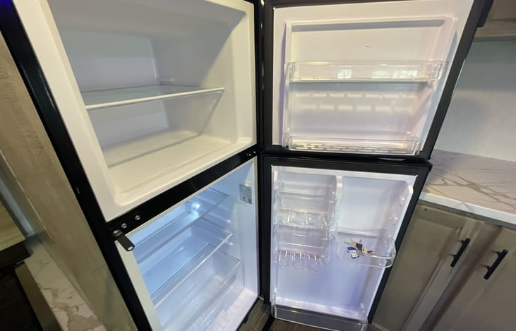 Full 11 cu foot fridge that will be stocked with basic essentials for camper use.  Community style (pay it forward) so feel free to bring your own if that is an issue.