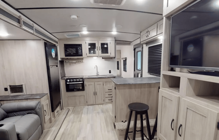 The domed ceilings offer great head space! The bar seating area gives a place to gather in the heart of the action. An HDMI cable is available to plug gaming systems into the TV!