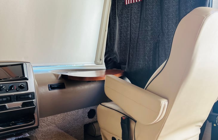 Front passenger seat with desk open