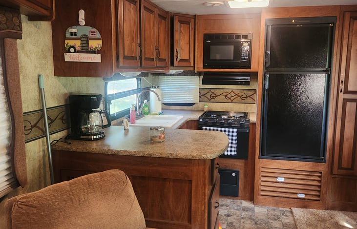 Full kitchen stocked with everything you need to cook.