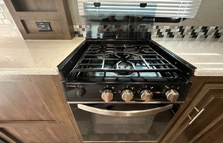 Propane operated stove- includes 3 x burners and oven.
