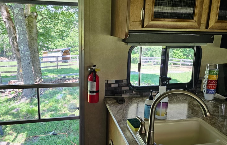 kitchen sink with all cleaning supplies for your needs.