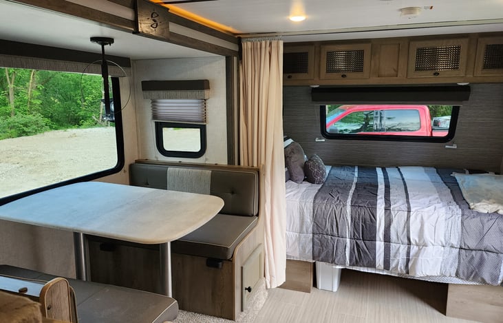 New queen-sized mattress, bedding included.