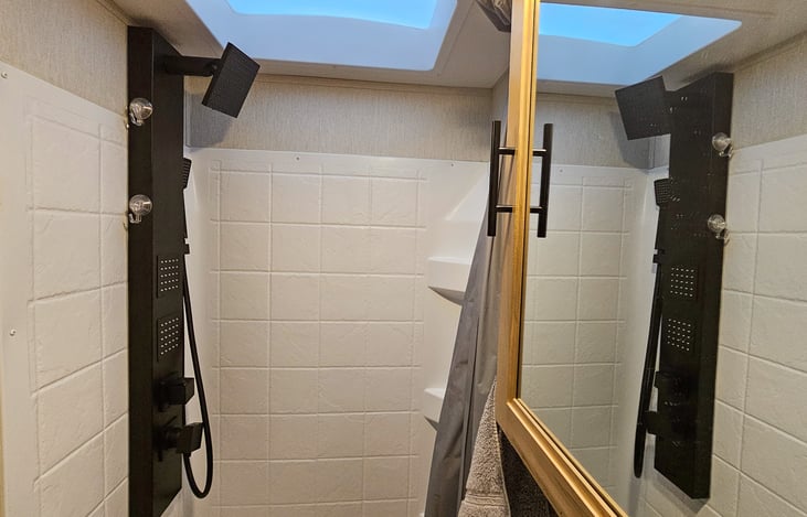 Luxury shower with on demand hot water. Best way to get clean.