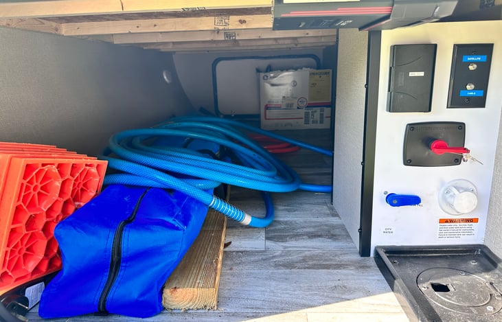 10x10 pop up Canopy to use. Water hookup. Underneath storage